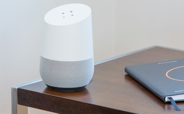 A person uses Google Assistant to find Santa Claus's current location.