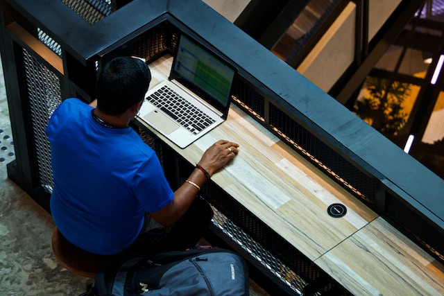 A person inputting data into Microsoft Excel to convert it into a map chart.