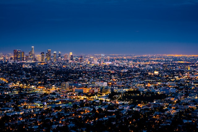 An overview of a city's landscape at night.