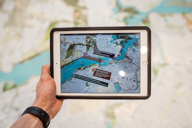A user checking out a street view on their iPad via a navigation app.