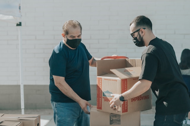 A delivery driver and his customer