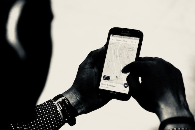 A person enters geographic coordinates to find a specific location on Google Maps.