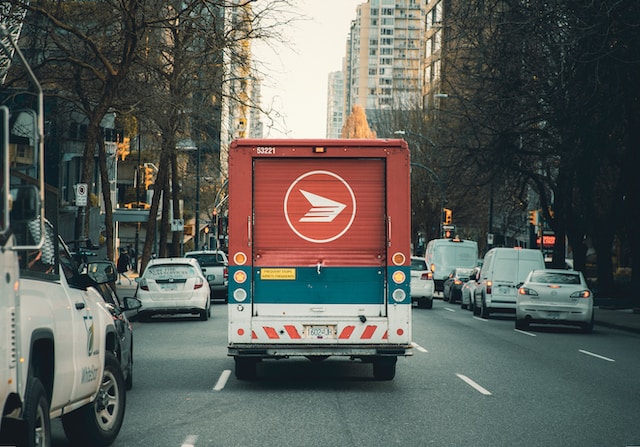 A truck on a designated route to deliver goods to customers.